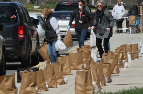 Parents picking up meals near Baltimore