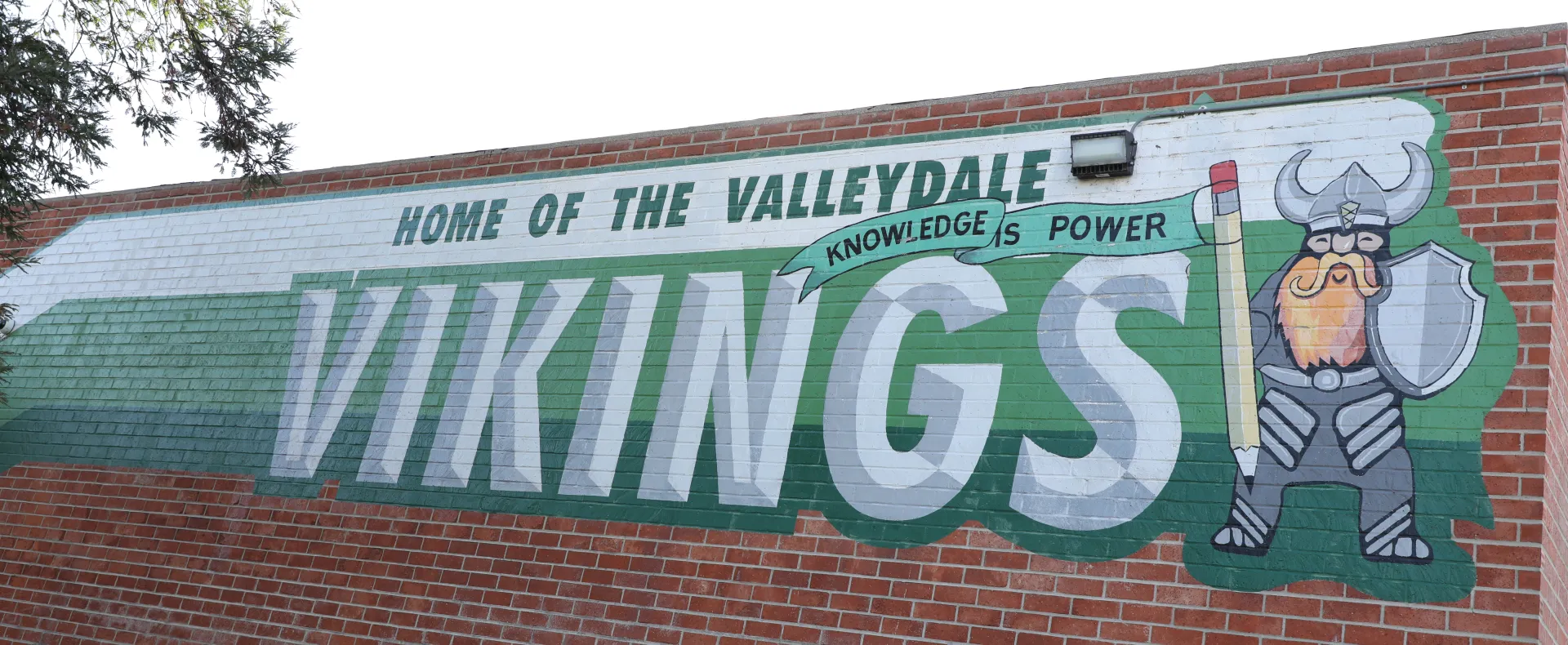Vikings mural in brick wall